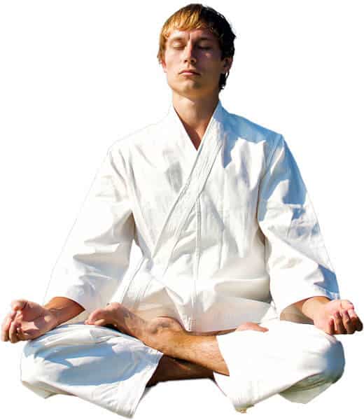 Martial Arts Lessons for Adults in Strongville OH - Young Man Thinking and Meditating in White